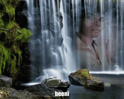 a man standing next to a waterfall with a po of him