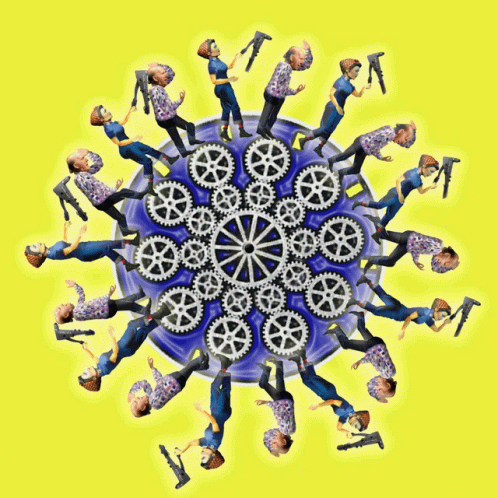 a group of people standing on top of a blue and red snowflake
