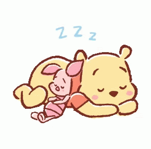 a cartoon bear sleeping next to a stuffed animal