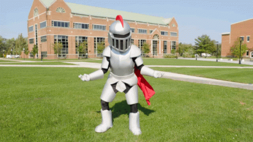 a 3d man in a knight suit on green grass