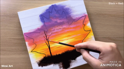 a person is holding a pencil and painting an image on paper