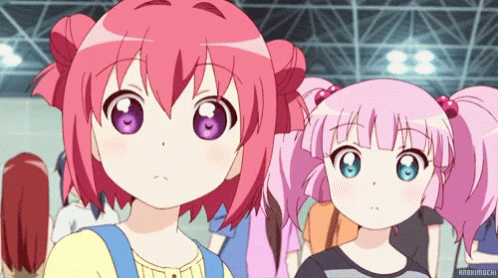 anime girls with pink hair look like they have yellow eyes