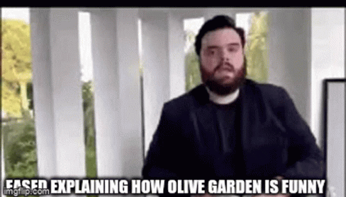 a man standing in front of some windows with the caption saying, jesus explaining how olive garden is funny