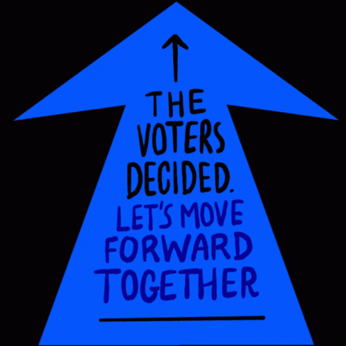 a large orange triangular sign reading thevoters decided lets move forward together