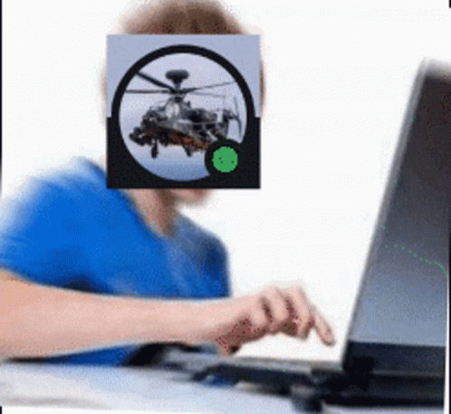 a man that has a laptop and a helicopter over their face