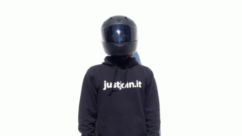 a woman wearing a motorcycle helmet with the words stutin'it on it