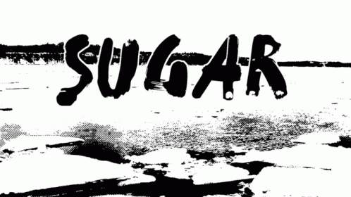 a black and white pograph with the words sugar
