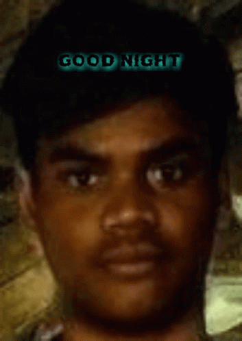 a young man wearing a blue outfit and with the text good night in the dark