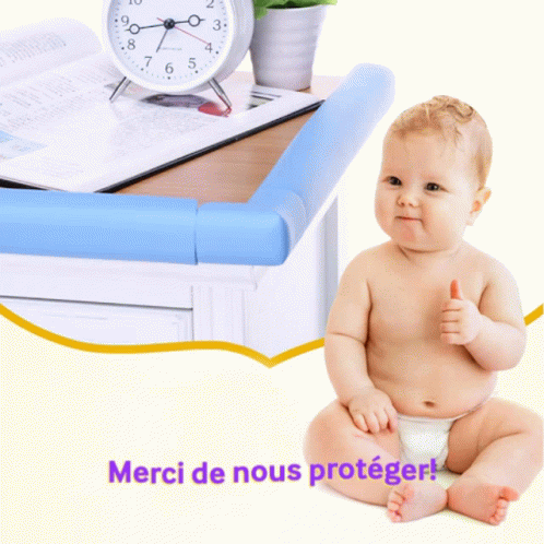 baby siting on potty next to desk with clock