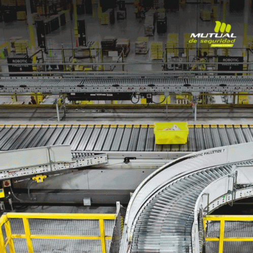 the industrial belt of a large factory with the company logo