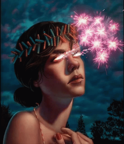 a woman with her eyes closed holding some kind of sparkler