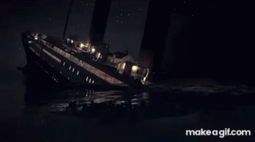 a boat is seen at night in the water