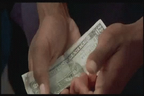 two hands reaching into one another with dollar bills