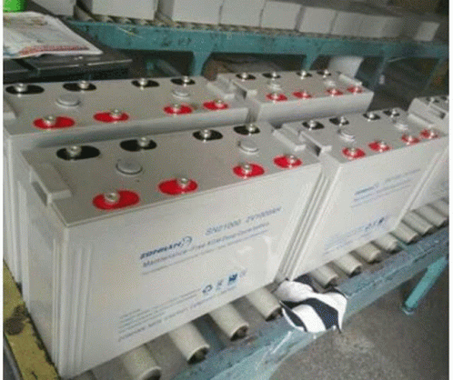 several boxes of batteries sitting on a table