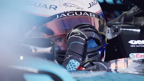 the helmet and gloves of the jaguar racing team