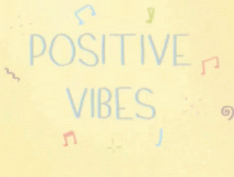 there is writing on a wall that says positive vibes