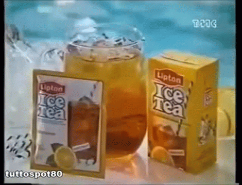 a package and two boxes of ice tea on top of a counter