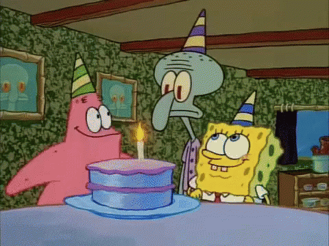 sponge bob and patrick with one birthday cake on the table
