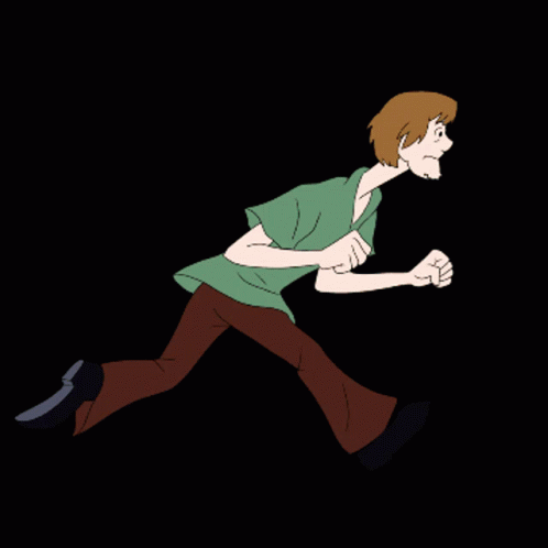 man running in the dark with his arms folded