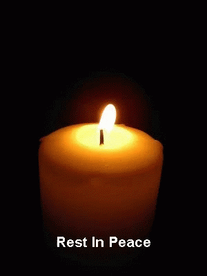 lit candle glowing in dark blue color with the words rest in peace