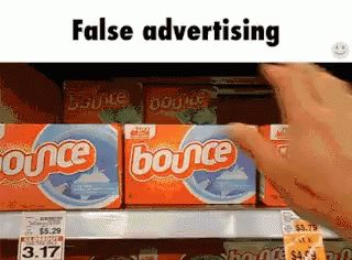 a couple of packages of bounce advertise in front of some shelves