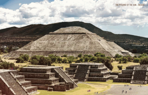 an aerial view of a pyramid with two smaller pyramids