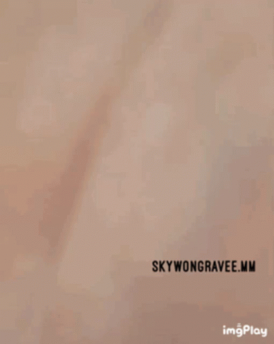 a plane flying through a blue sky with the words skywonsgrave mn above it