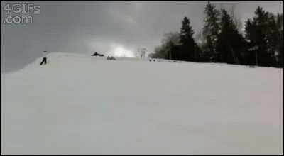 a view of a person skiing down the hill