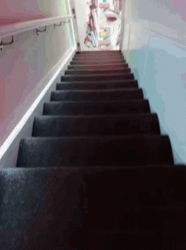 an image of a stairway with stairs going down it