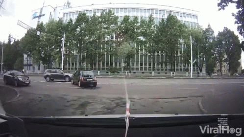 a camera view of some people driving around in a car