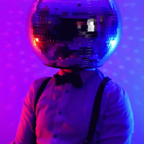 a shiny silver ball wearing a bow tie and a bow - tie