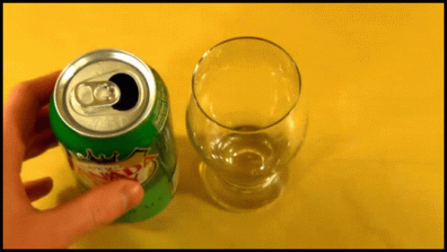 a can with a glass full of water