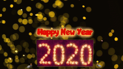 a sign reading happy new year with glowing lights on it