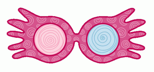 two eyes with spirals on them sitting on a white surface