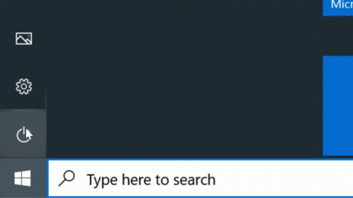 a computer screens shows the type here to search