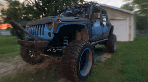 large truck with a front bumper and mud tires