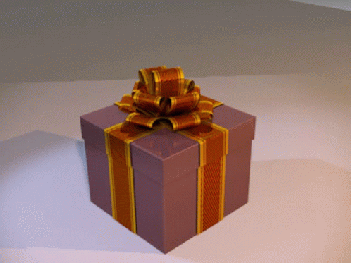a small box with a large bow on top of it
