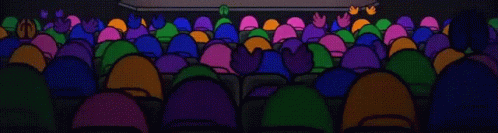 colorful rows of seats in an auditorium at night