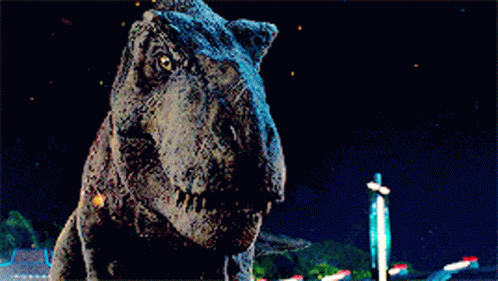 a grembopt dinosaur that is looking at a camera