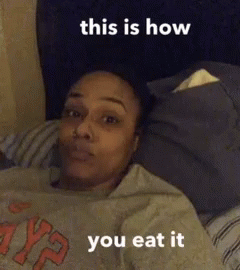 a man laying in bed with the captioning of an adult is saying, this is how you eat it