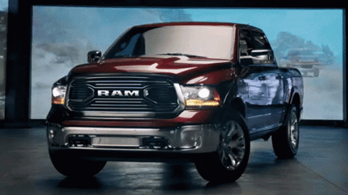 the large blue ram is parked in a showroom