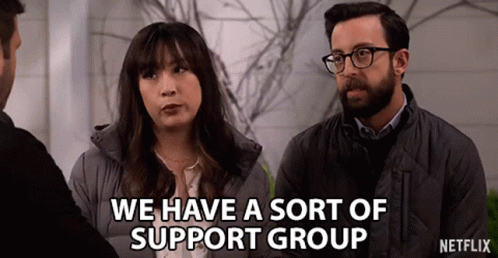 three people are standing with the text we have a sort of support group