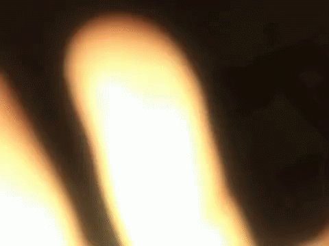 blurry image of a white object on a table
