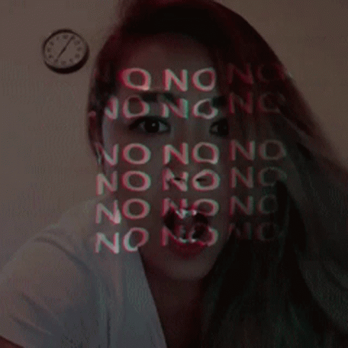 a girl with text on her face near a clock