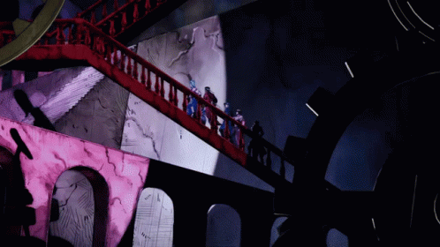 a picture of a bridge with many dolls at night