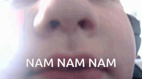 an animated po of a man's face with the words nam nam nam in front of him