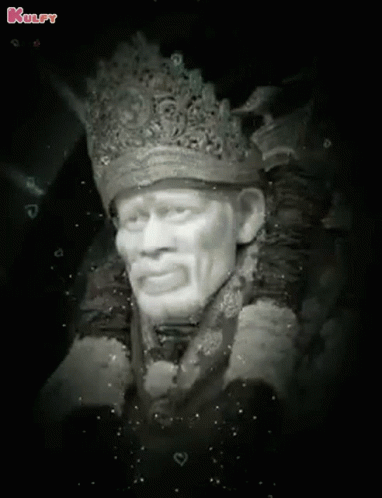 an old - time black and white po of a man with a crown