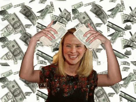a woman is holding cash in her hands