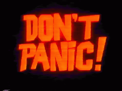 blue text in a dark background with don't panic on it