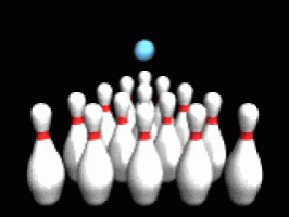a group of bowling pins lined up next to an odd ball